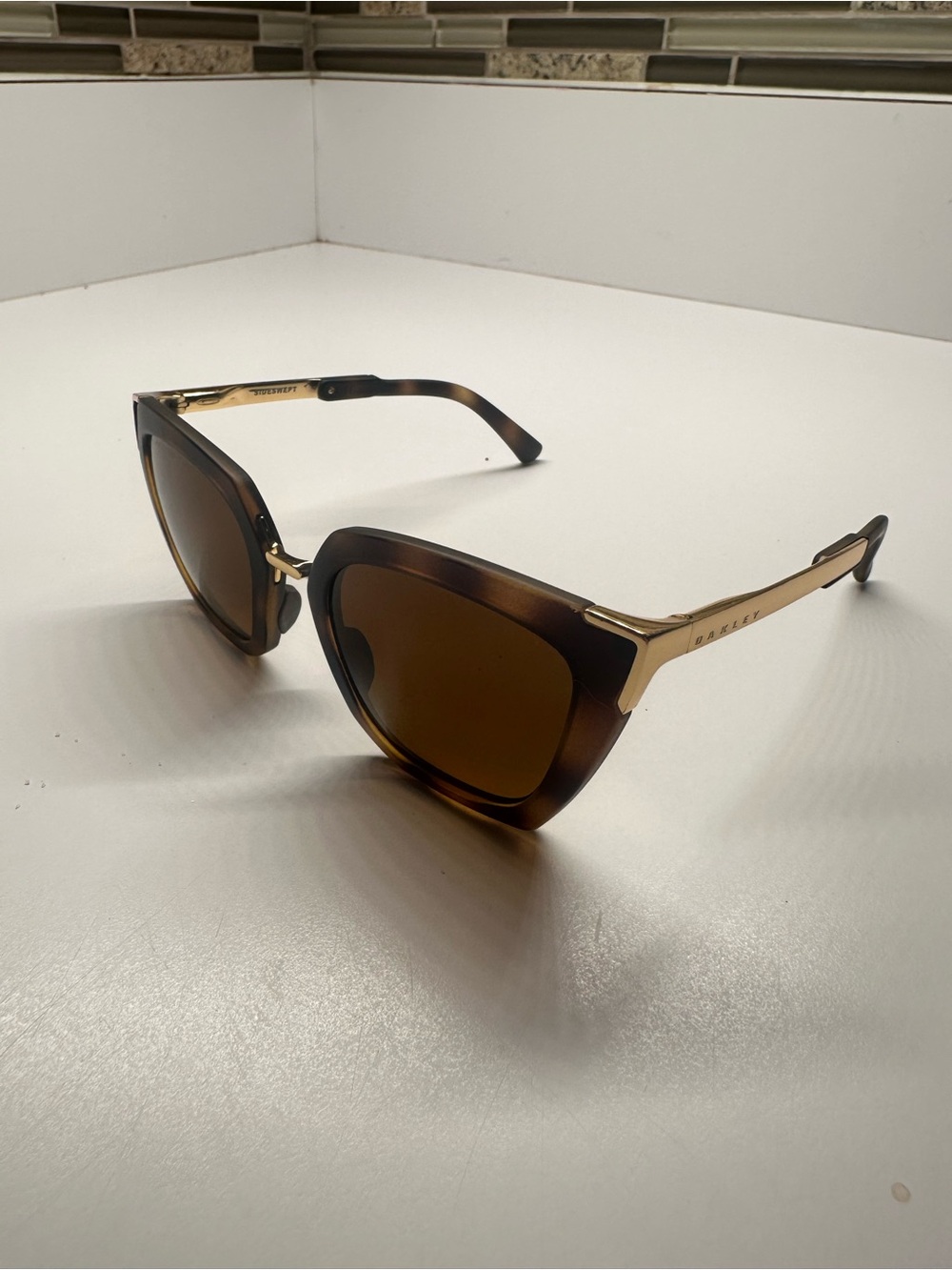 Oakley Women’s Tortoiseshell & Gold Cateye Sunglasses with Brown Lenses